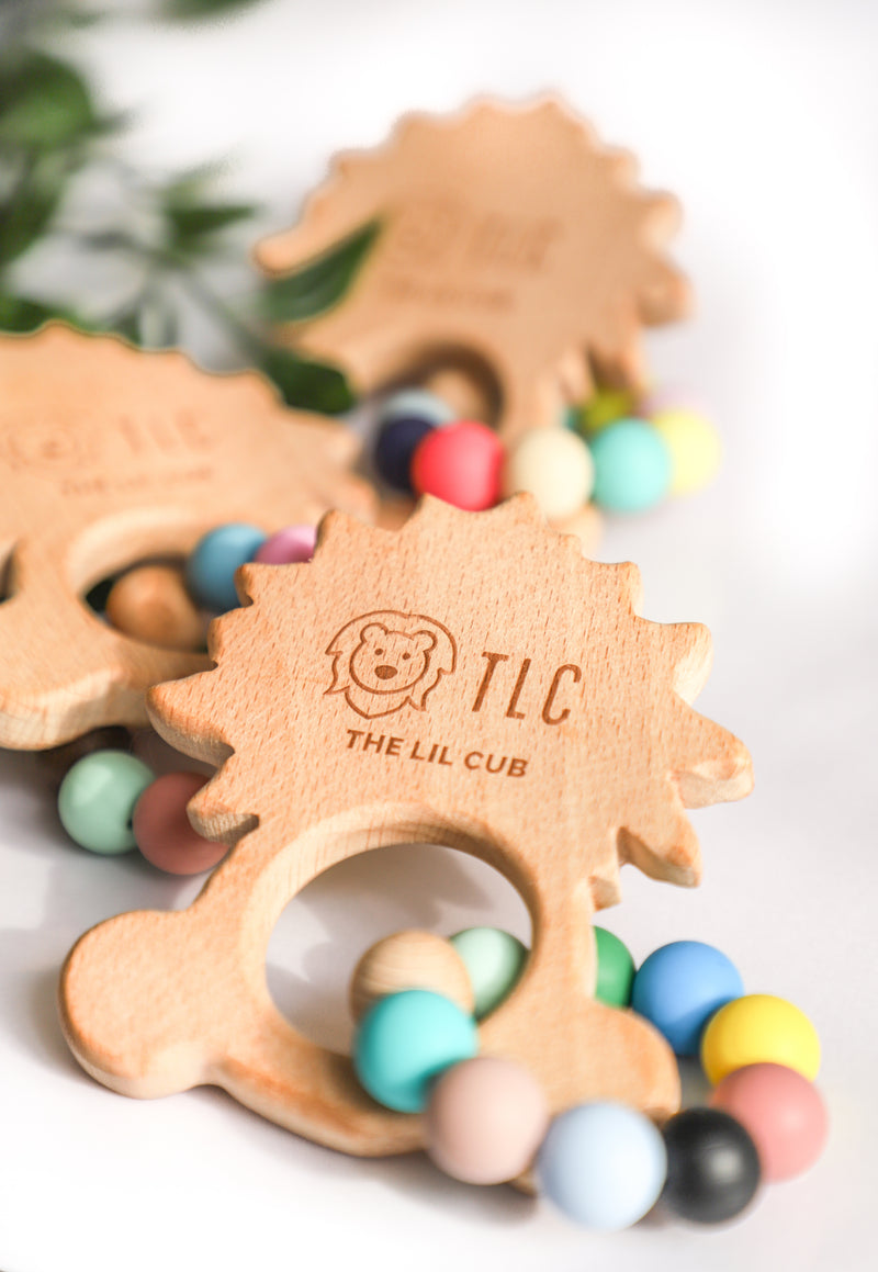 The Lil Cub Wooden teether with silicone beads