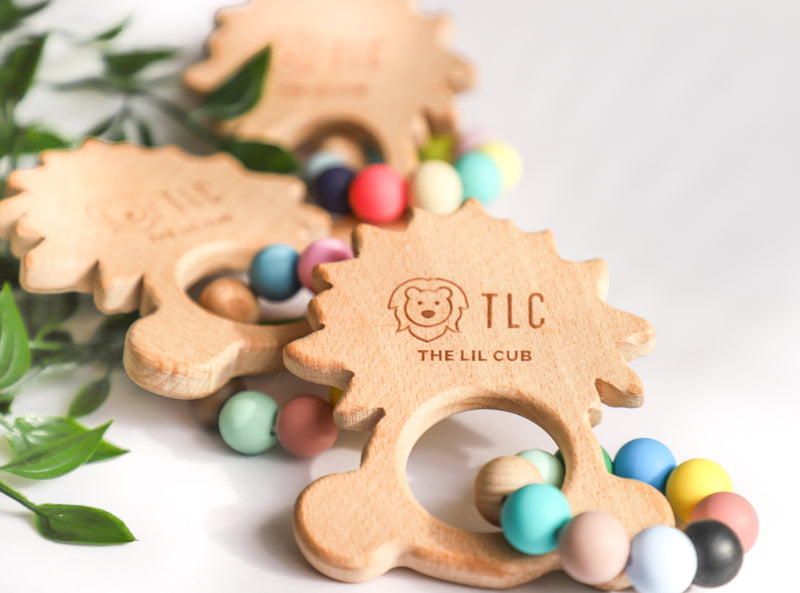 The Lil Cub Wooden teether with silicone beads